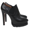 platform ankle boots in black leather