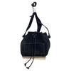 drawstring bucket bag in black suede