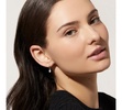- Pearl Huggie Hoops  - Frida Silver
