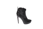 alaia ruffled ankle boots in black leather