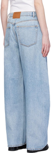 Light blue distressed flare jeans