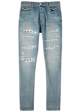 Quad Repaired distressed skinny jeans 
