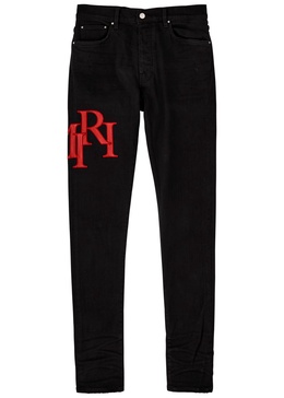 Staggered logo skinny jeans 