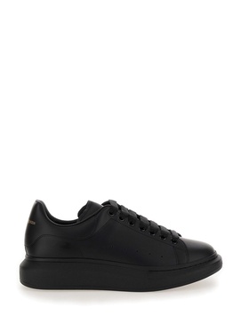 Black Sneakers with Logo Lettering on the Rear and Oversize Rubber Sole in Leather Man