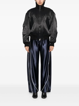 Blue sporty pants with linear details