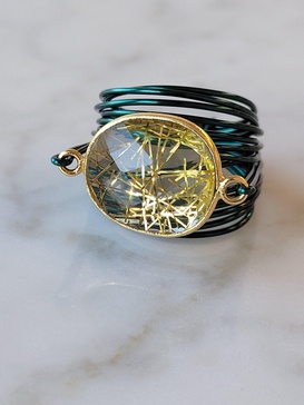 torrey ring in green with golden rutilated quartz