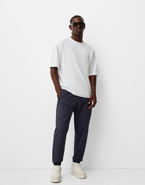 Bershka nylon pants in navy