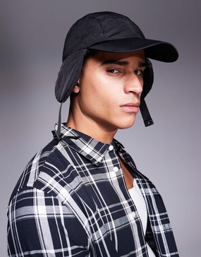 ASOS DESIGN nylon puffer trapper cap in black