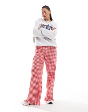 ASOS DESIGN gingham pants with frill hem in red
