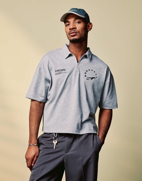 ASOS DESIGN boxy oversized zipped polo with sports graphic in gray heather rib