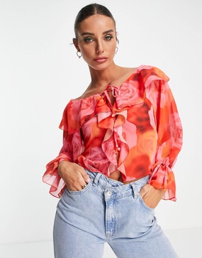 ASOS DESIGN ruffle front blouse with tie in blurred rose print