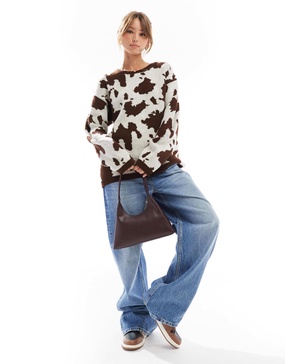 ASOS DESIGN fluffy knitted sweater in cow print