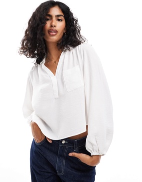 ASOS DESIGN v neck pocket detail soft blouse in ivory