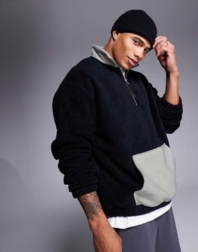 ASOS DESIGN oversized fleece sweatshirt with quarter zip and pocket in black