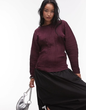 ARKET plisse top with sculptural sleeves in burgundy