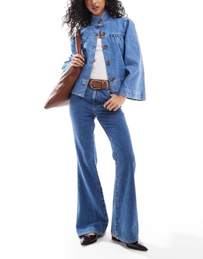 ASOS DESIGN super high waist flared jeans in mid blue
