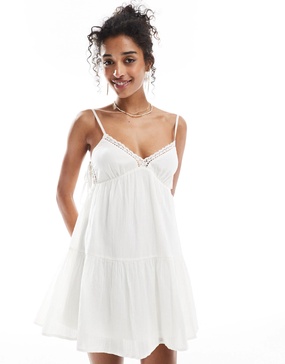 Bershka strappy lace trim tiered mini dress in white