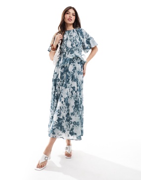 ASOS DESIGN puff sleeve midi dress with gauged waist in blue floral print