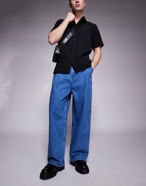 ASOS DESIGN oversized baggy jeans with side belts in mid wash blue