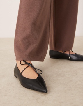 ASOS DESIGN Lithe pointed toe ballet flats with vamp tie in black