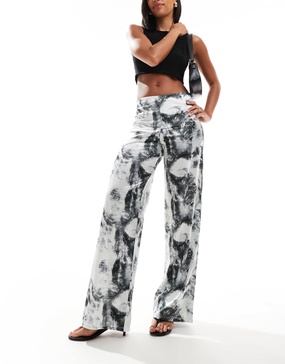 ASOS DESIGN wide leg satin twill pants in distorted animal print
