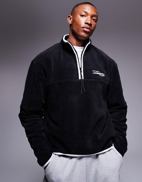 ASOS DESIGN boxy oversized fleece quarter zip sweatshirt with contrast binding and print in black