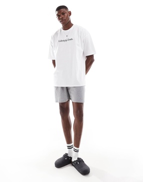 ASOS DESIGN pajama set with lifestyle goals slogan in white