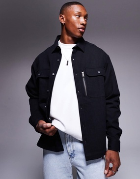ASOS DESIGN oversized boxy shirt with patch pockets in black