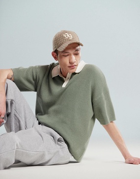 ASOS DESIGN relaxed boxy fit knitted polo with 3/4 length sleeves in sage green