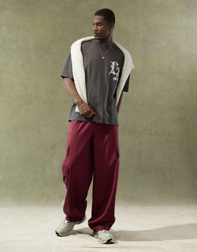 ASOS DESIGN super baggy cargo pants with elastic waist in burgundy