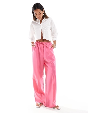 ASOS DESIGN tailored pull on pants in pink