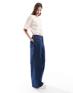 ASOS DESIGN slouchy wide leg jeans in mid blue