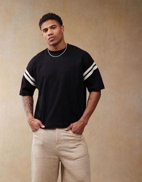 ASOS DESIGN oversized boxy T-shirt with white paneling in black