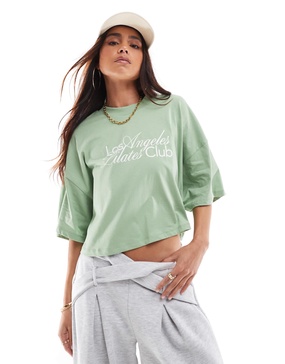 ONLY LA Pilates Club print cropped t-shirt in light green