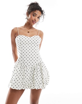 Bershka bubble hem mini dress in ecru polka dot