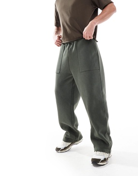ASOS DESIGN wide leg sweatpants with pocket details in washed green