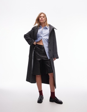 Topshop faux leather awkward length shorts in washed brown