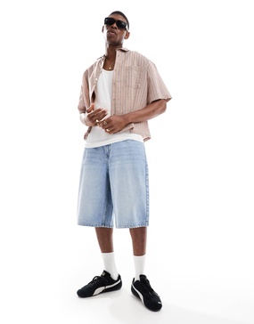 Bershka baggy denim shorts in mid blue
