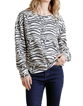 animal print high low top in cream