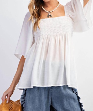 smocked babydoll tunic top in white
