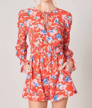 by the bay tropical print long sleeve romper in red multi floral print