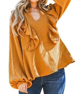 ruffle blouse in rust