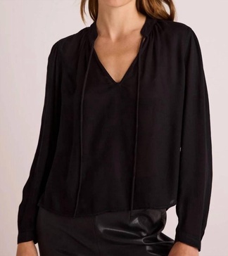 flowy tie neck pullover top in black