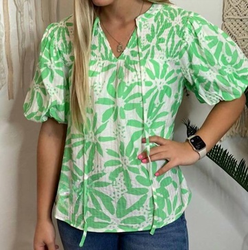 floral top with ruching and tie at neck in neon mint and white