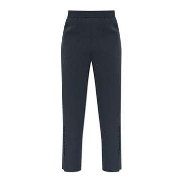 Crépon trousers with button detail at the hem