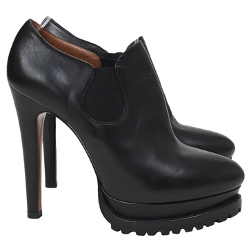 platform ankle boots in black leather
