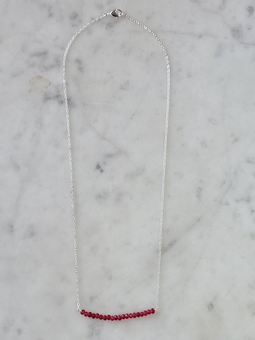 A Blonde and Her Bag Necklaces