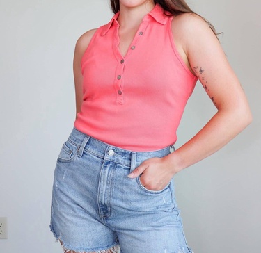 norah sleeveless polo in passionfruit