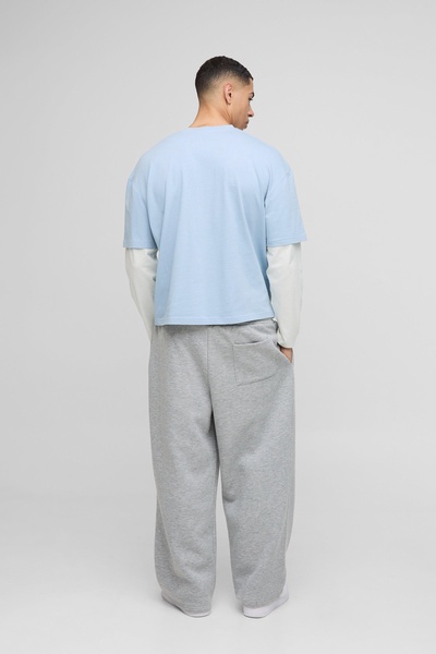 Oversized Boxy Woven Tab Faux Layer Sleeve Graphic V Neck T-Shirt