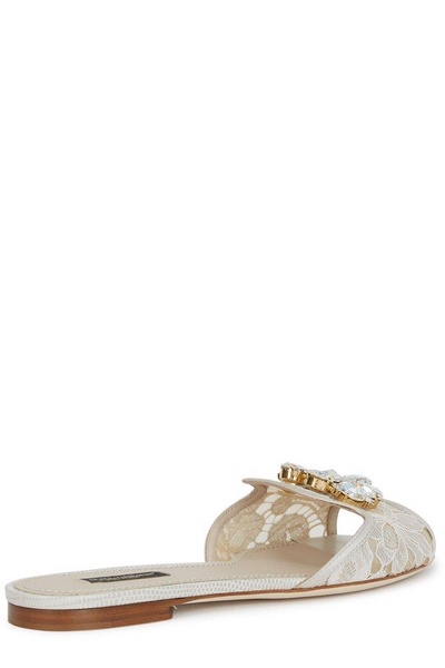 flat sandals with lace and brooch